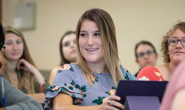 Photo d'étudiants dans une classe 