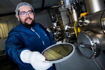 Picture of a man working with a machine