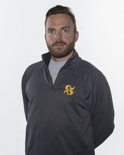 Anthony Bouthiller-Hénault, entraîneur-chef de l'équipe de badminton du Vert & Or